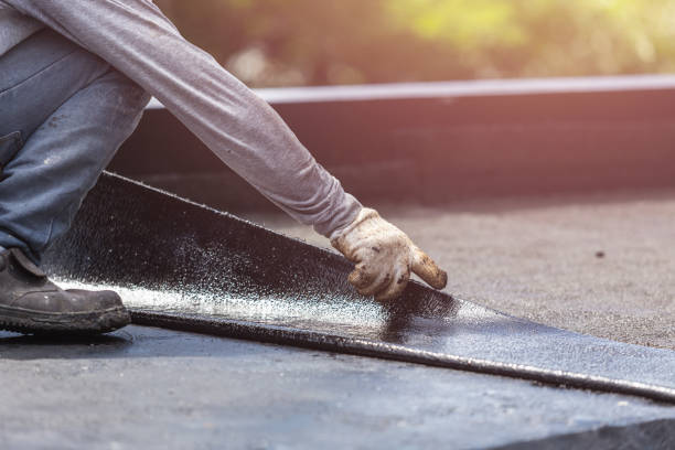 Professional Basement Waterproofing technician working in Gypsum, OH